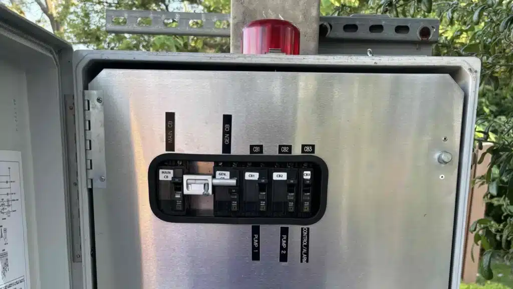 A lift station control panel showing the high water alarm.